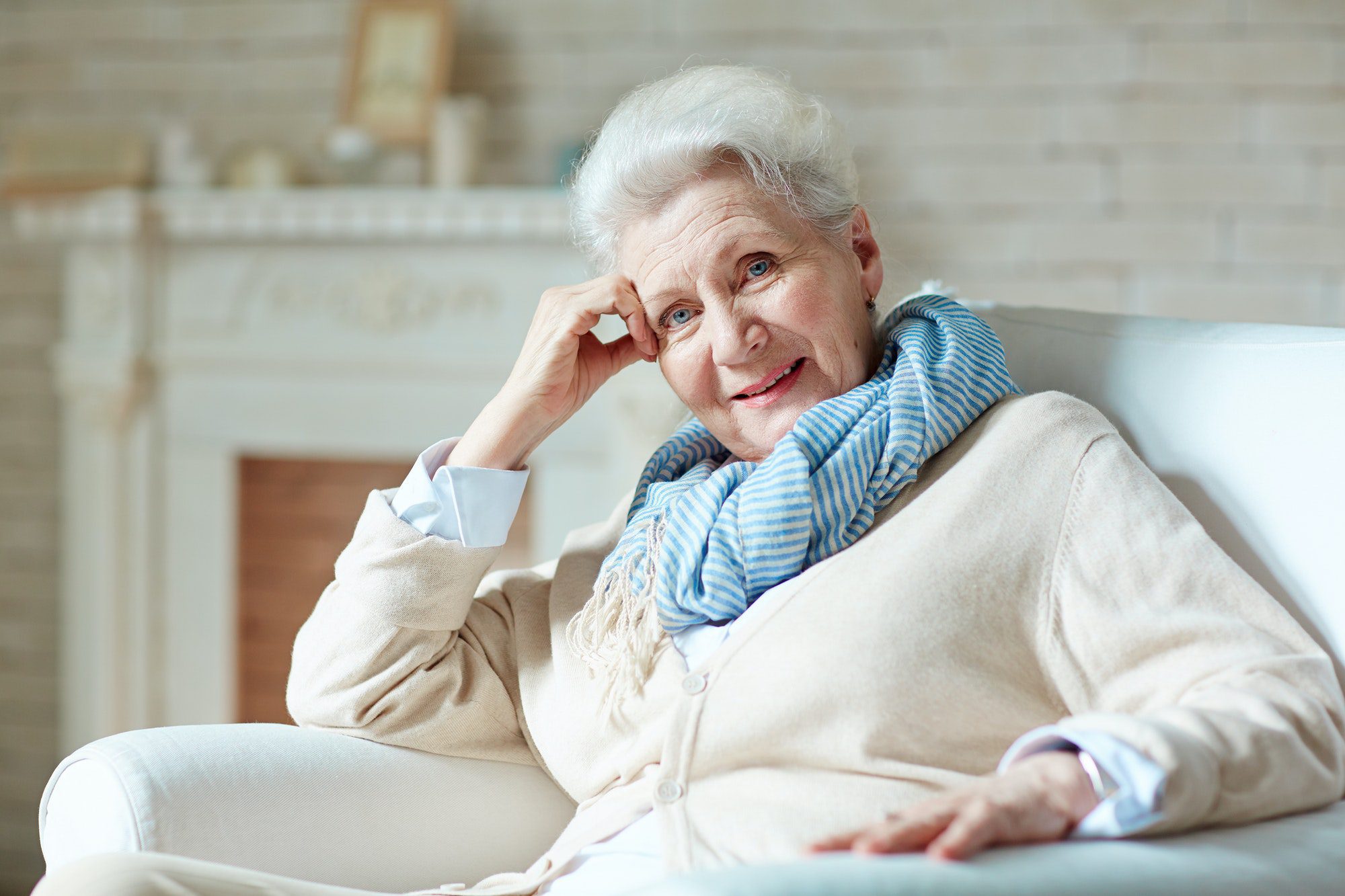 Senior woman happy to find out about new ways to save money on medicare in 2022.