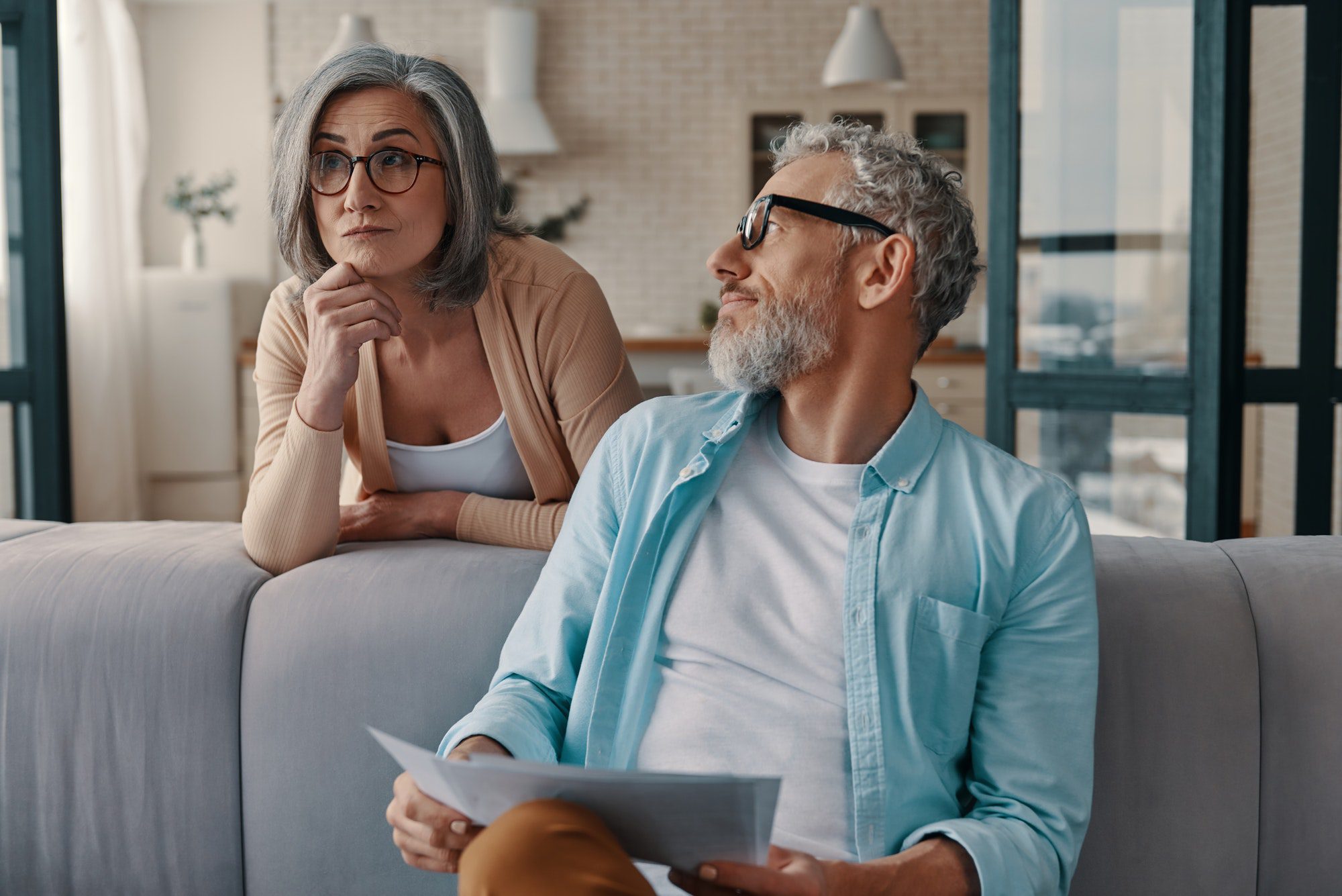 Thoughtful senior couple going over their Medicare Eligibility Requirements