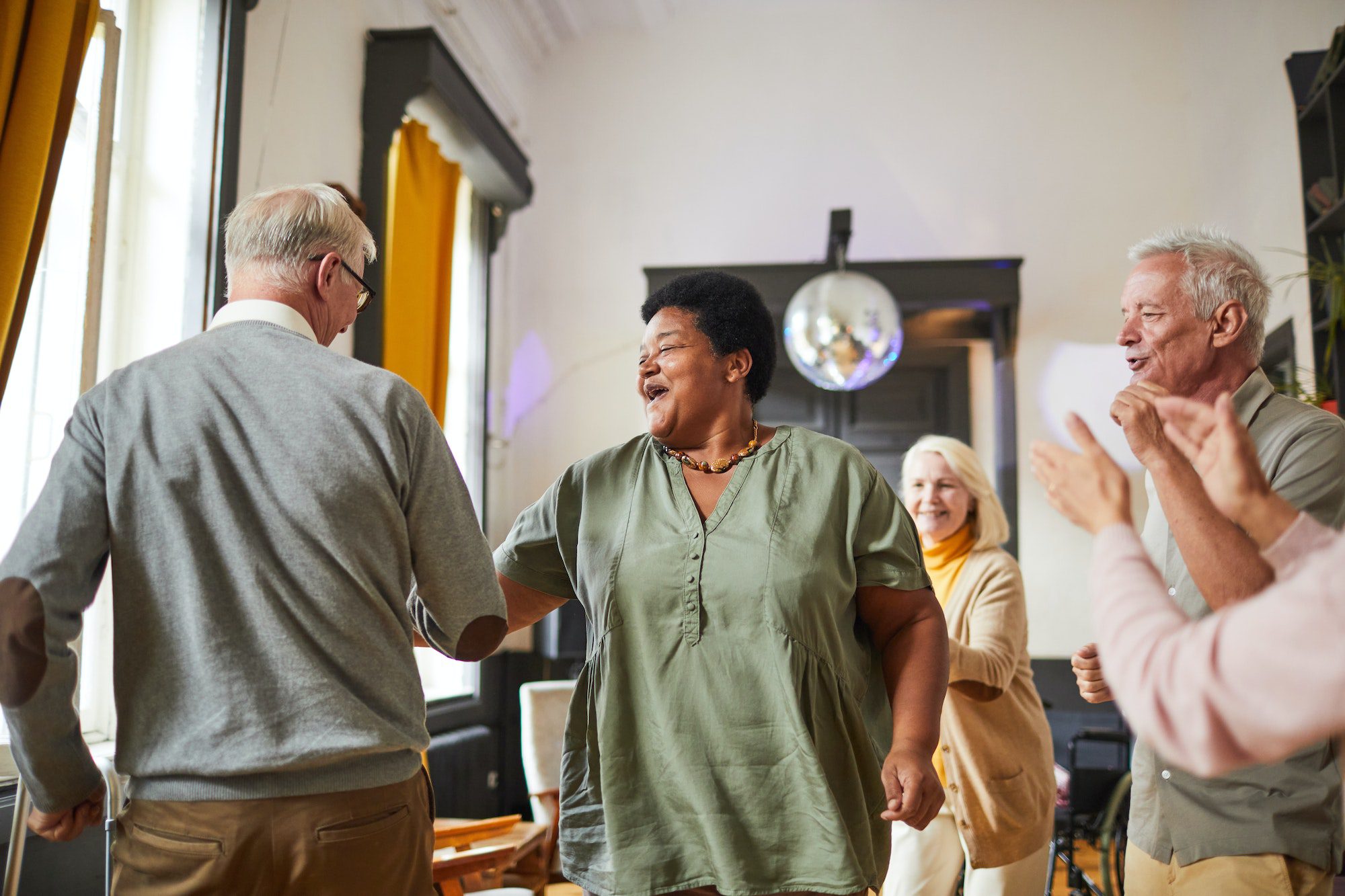 Senior People Dancing in Nursing Home on a Medicare Choice Plan